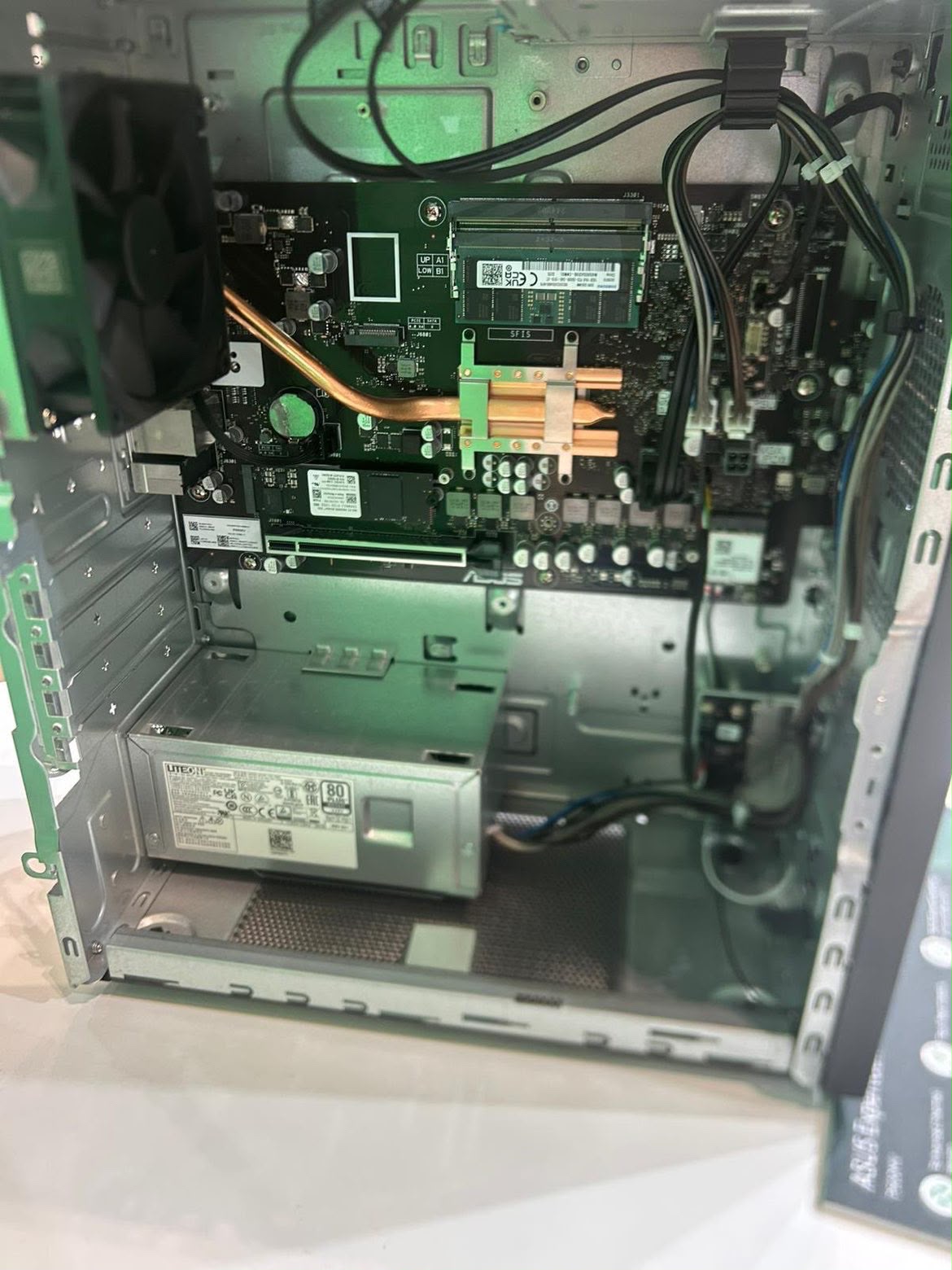 Open desktop computer during internal hardware inspection and component work